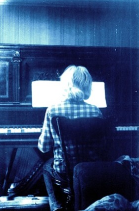 me at our old piano... very early days!
